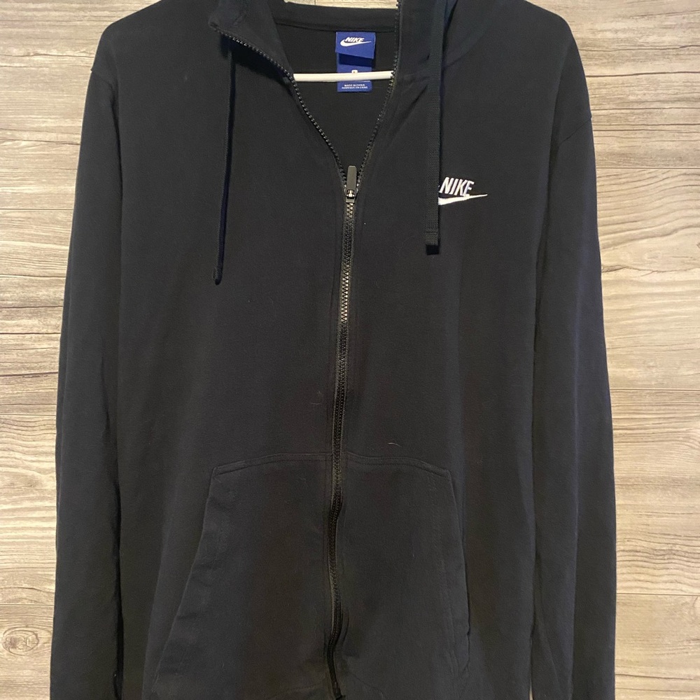 Size L but fits like a medium mens nike Zip up sweatshirt hoodie